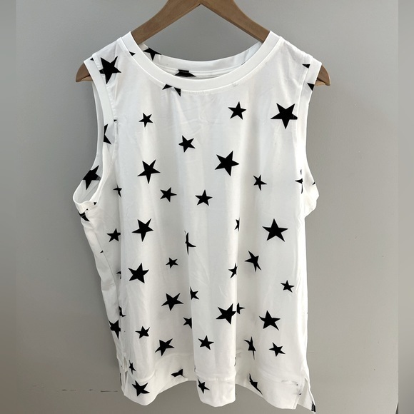 Source Unknown Tops - Woman’s sleeveless top. NWOT. White with black star pattern. VERY SOFT!